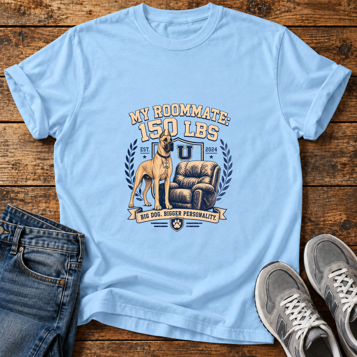 Roommate Pup Great Dane graphic T-shirt in Light Blue, shown on a flat-lay shirt mockup