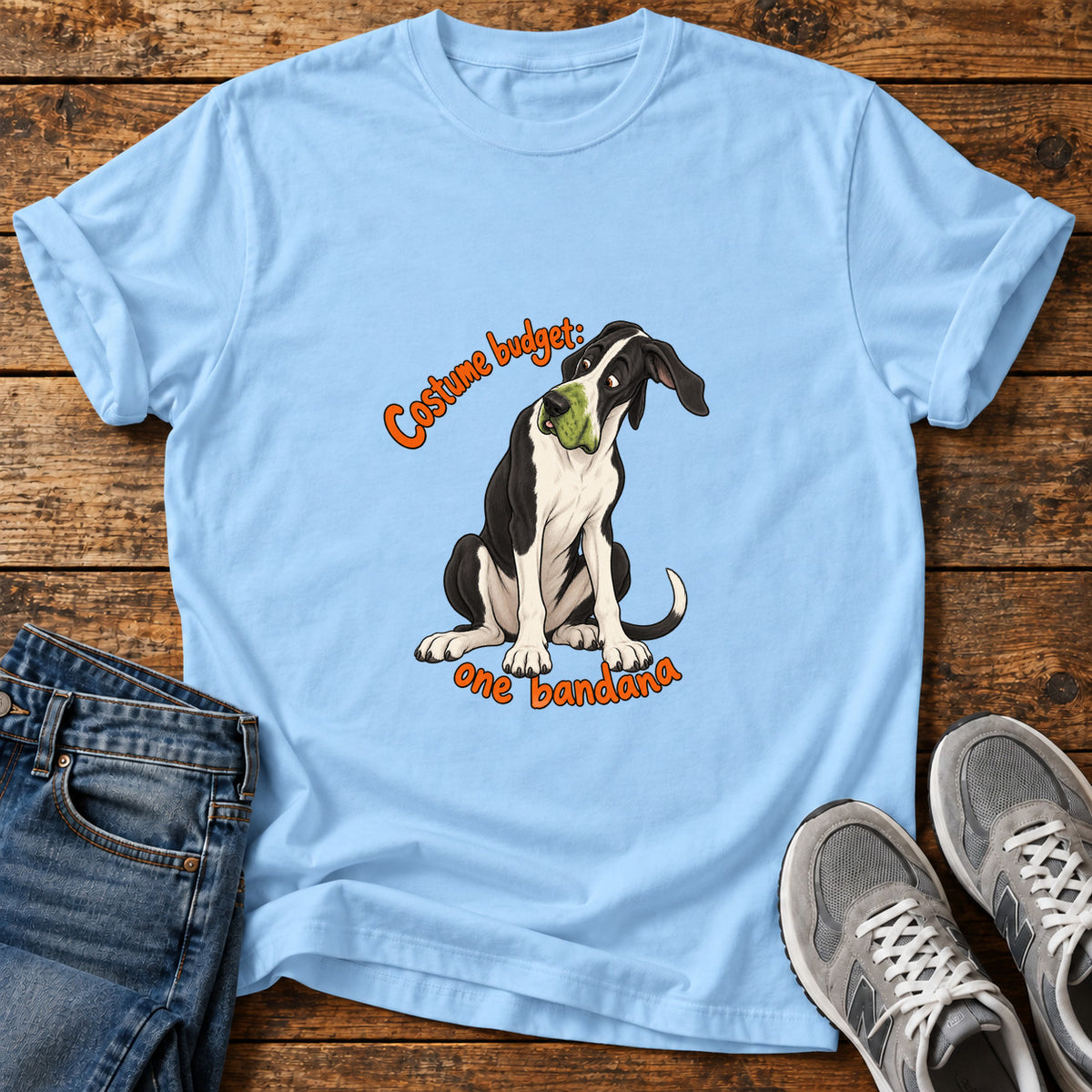 Costume Budget Great Dane graphic T-shirt in Light Blue, shown on a flat-lay shirt mockup