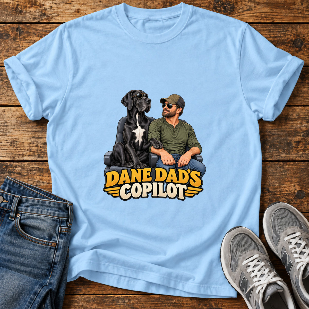 Dane Copilot Great Dane graphic T-shirt in Light Blue, shown on a flat-lay shirt mockup