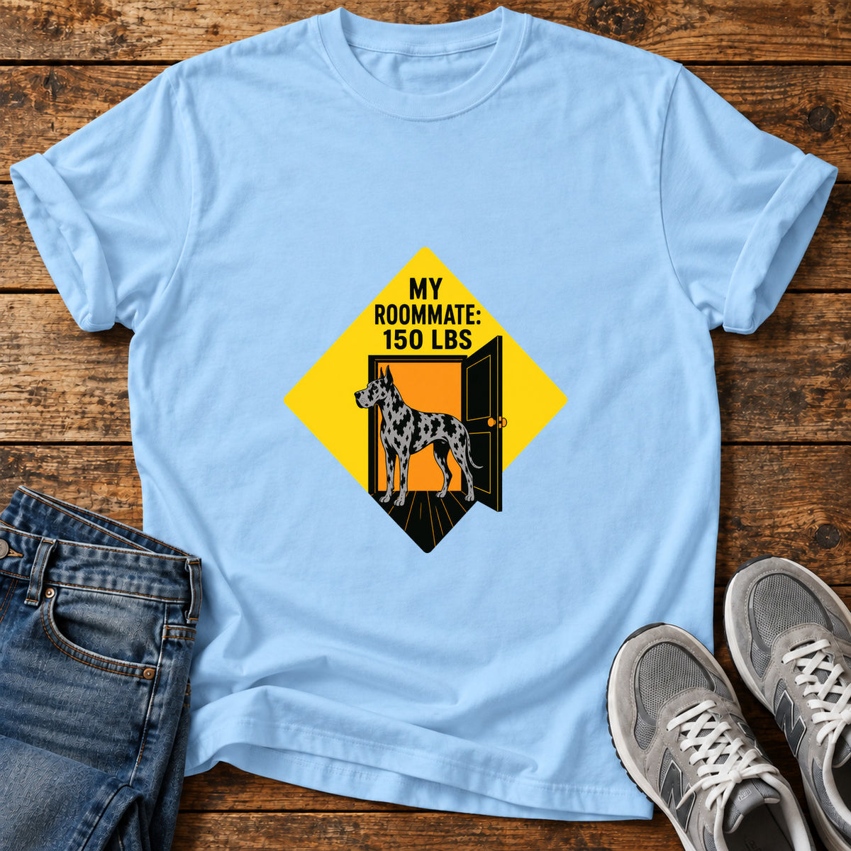 Roommate Dog Great Dane graphic T-shirt in Light Blue, shown on a flat-lay shirt mockup