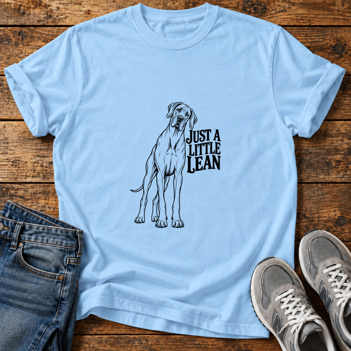 Just A Lean Great Dane graphic T-shirt in Light Blue, shown on a flat-lay shirt mockup