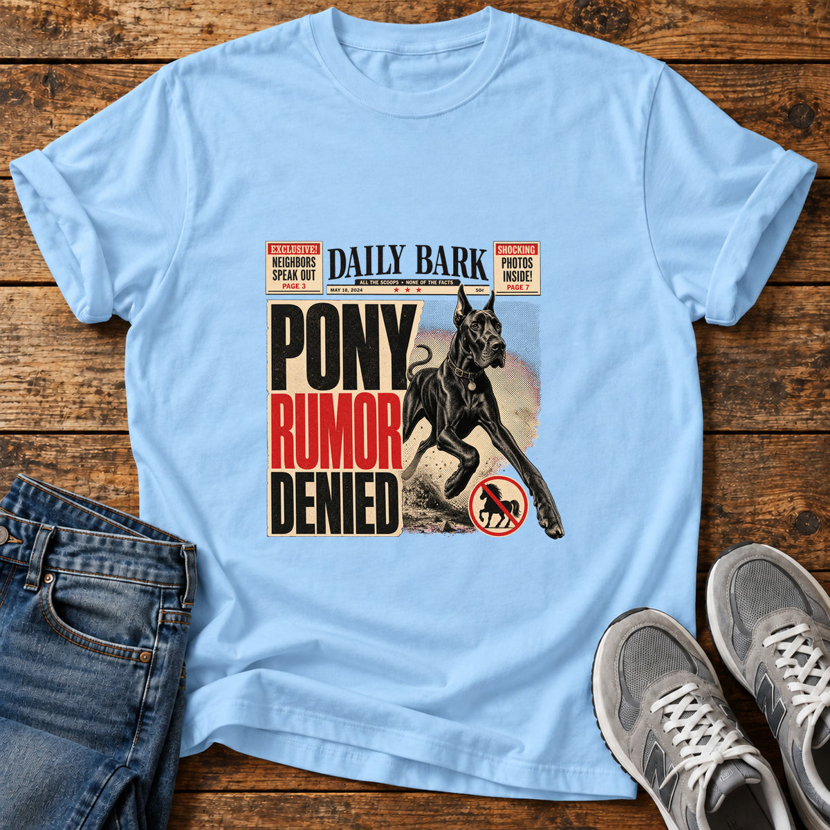 Pony Rumor Great Dane graphic T-shirt in Light Blue, shown on a flat-lay shirt mockup