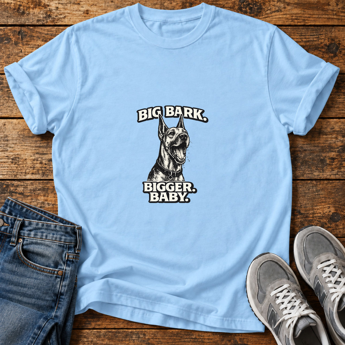 Big Bark Great Dane graphic T-shirt in Light Blue, shown on a flat-lay shirt mockup
