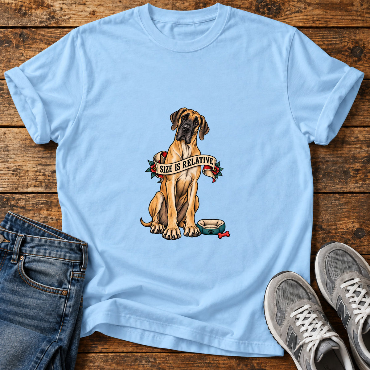 Size Is Relative Great Dane graphic T-shirt in Light Blue, shown on a flat-lay shirt mockup