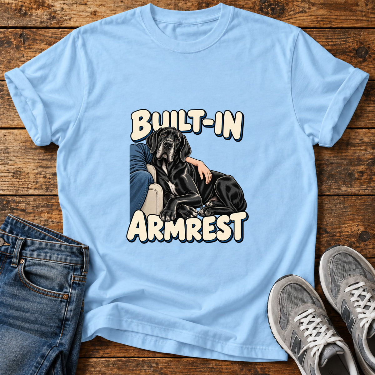 Built-In Armrest Great Dane graphic T-shirt in Light Blue, shown on a flat-lay shirt mockup