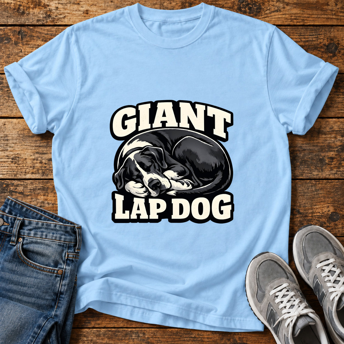 Giant Lap Dog Great Dane graphic T-shirt in Light Blue, shown on a flat-lay shirt mockup