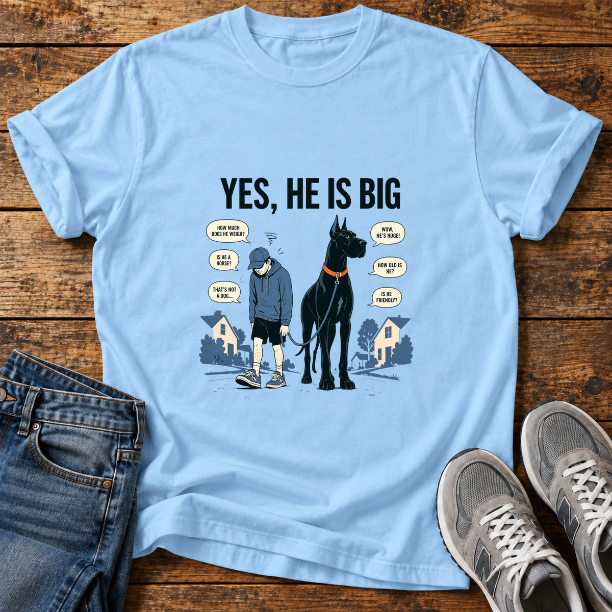 Yes He Is Great Dane graphic T-shirt in Light Blue, shown on a flat-lay shirt mockup