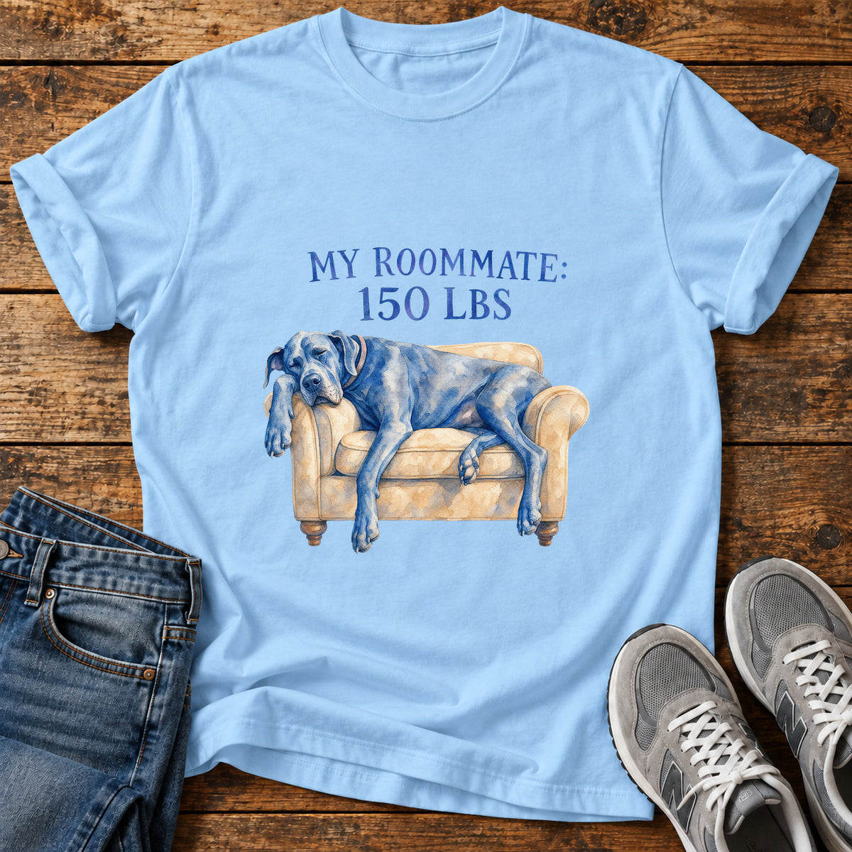 Roommate 150 Lbs Great Dane graphic T-shirt in Light Blue, shown on a flat-lay shirt mockup