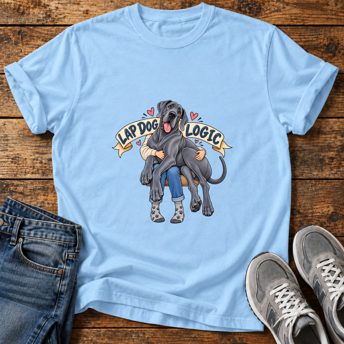 Lap Dog Logic Great Dane graphic T-shirt in Light Blue, shown on a flat-lay shirt mockup