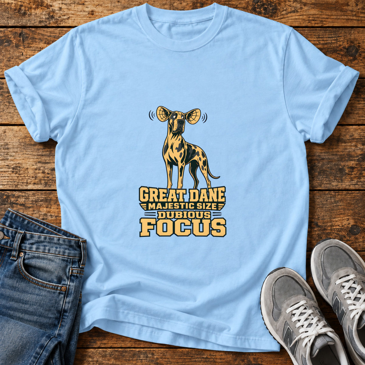 Dubious Focus Great Dane graphic T-shirt in Light Blue, shown on a flat-lay shirt mockup