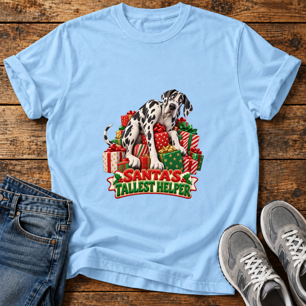 Santa's Tallest Helper Great Dane graphic T-shirt in Light Blue, shown on a flat-lay shirt mockup