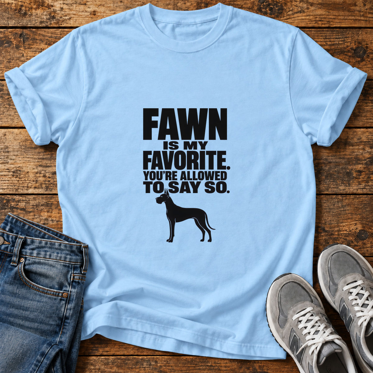 Fawn Favorite Great Dane graphic T-shirt in Light Blue, shown on a flat-lay shirt mockup