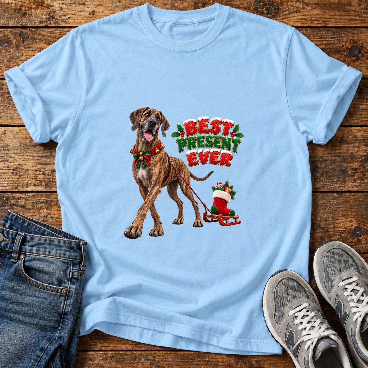 Best Present Ever Great Dane graphic T-shirt in Light Blue, shown on a flat-lay shirt mockup