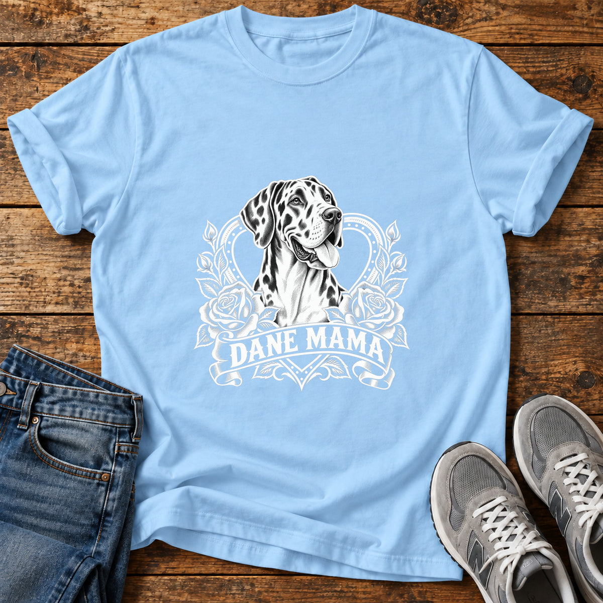 Dane Mama Great Dane graphic T-shirt in Light Blue, shown on a flat-lay shirt mockup