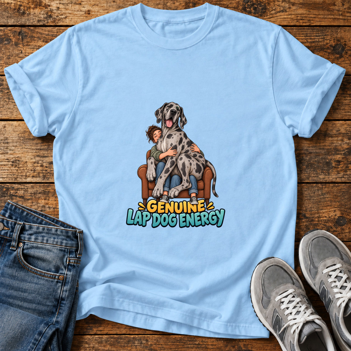Genuine Lap Dog Great Dane graphic T-shirt in Light Blue, shown on a flat-lay shirt mockup