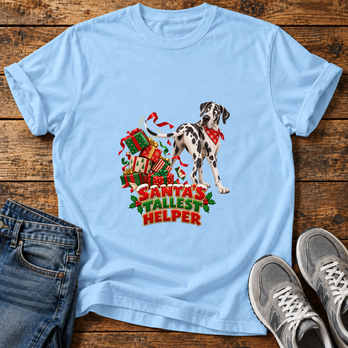 Santa's Tallest Helper Great Dane graphic T-shirt in Light Blue, shown on a flat-lay shirt mockup