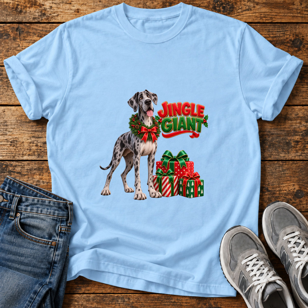 Jingle Giant Great Dane graphic T-shirt in Light Blue, shown on a flat-lay shirt mockup