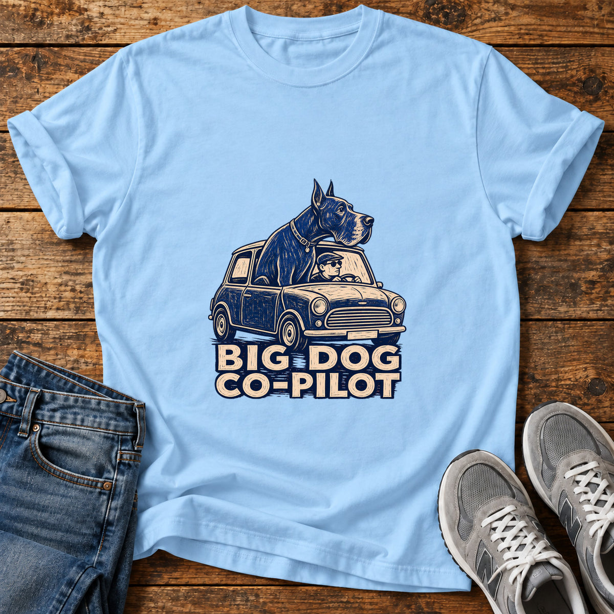 Big Dog Co-Pilot Great Dane graphic T-shirt in Light Blue, shown on a flat-lay shirt mockup