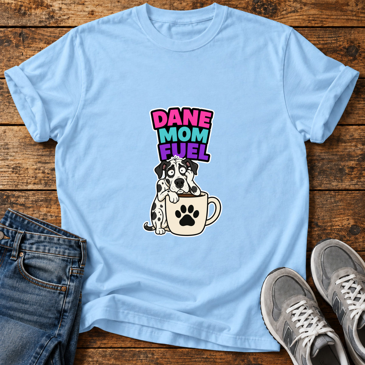 Dane Mom Fuel Great Dane graphic T-shirt in Light Blue, shown on a flat-lay shirt mockup