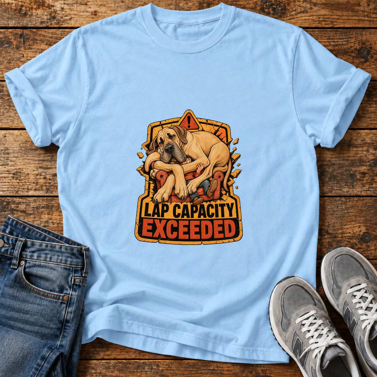 Lap Capacity Exceeded Great Dane graphic T-shirt in Light Blue, shown on a flat-lay shirt mockup