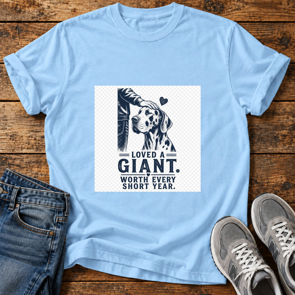 Loved A Giant Great Dane graphic T-shirt in Light Blue, shown on a flat-lay shirt mockup