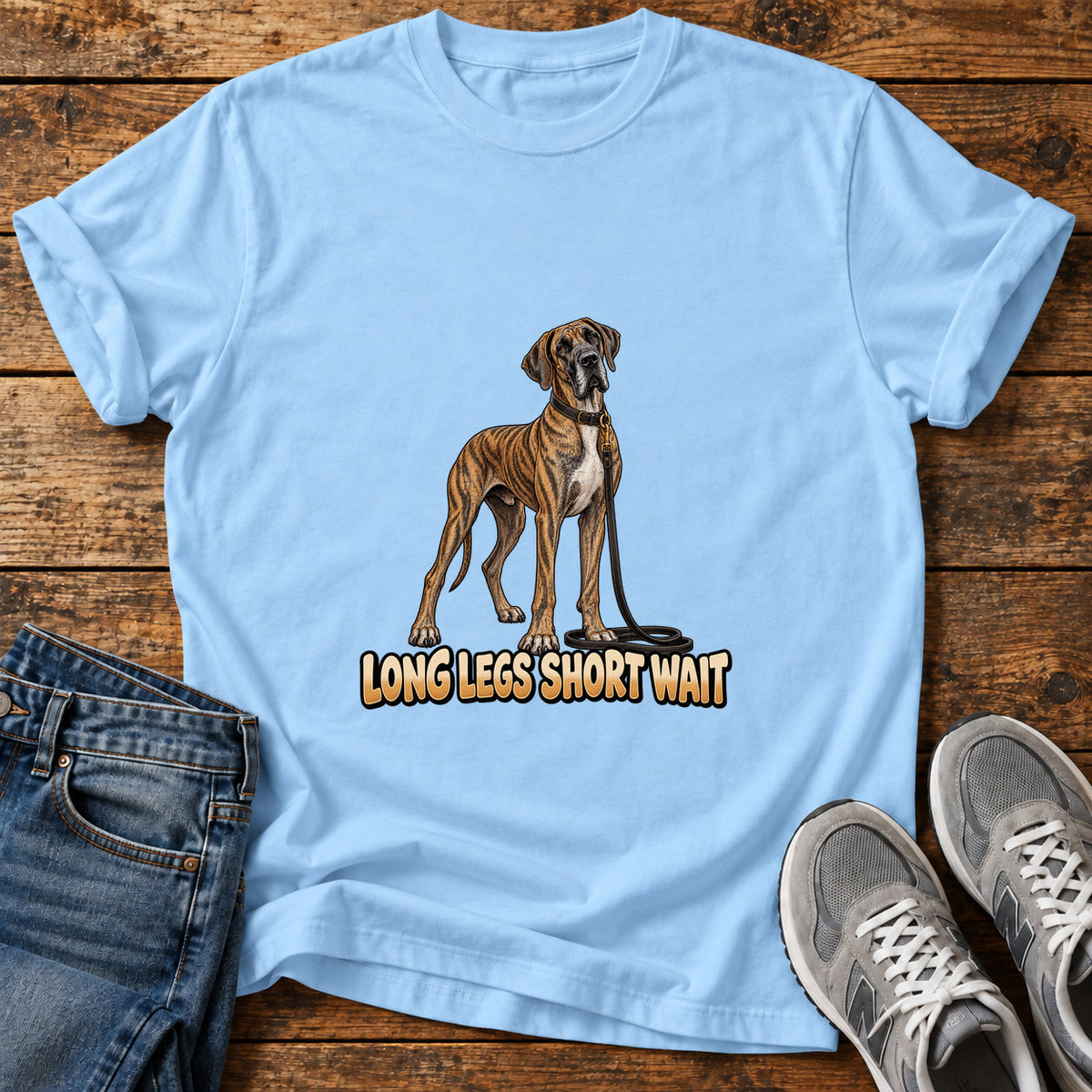 Long Legs Great Dane graphic T-shirt in Light Blue, shown on a flat-lay shirt mockup