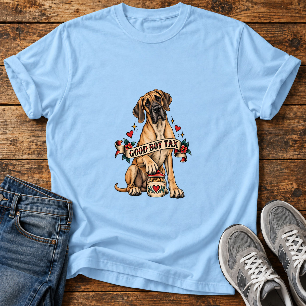 Good Boy Tax Great Dane graphic T-shirt in Light Blue, shown on a flat-lay shirt mockup