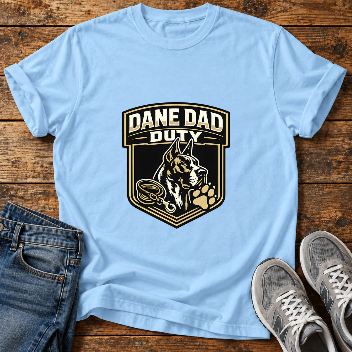 Dane Dad Duty Great Dane graphic T-shirt in Light Blue, shown on a flat-lay shirt mockup
