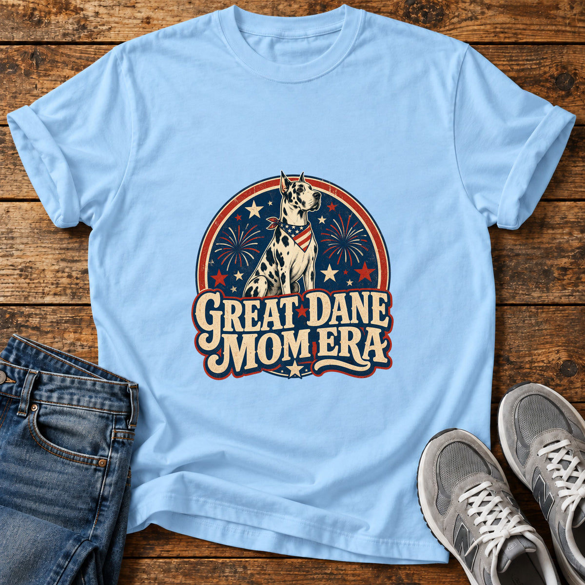 Great Dane Mom graphic T-shirt in Light Blue, shown on a flat-lay shirt mockup