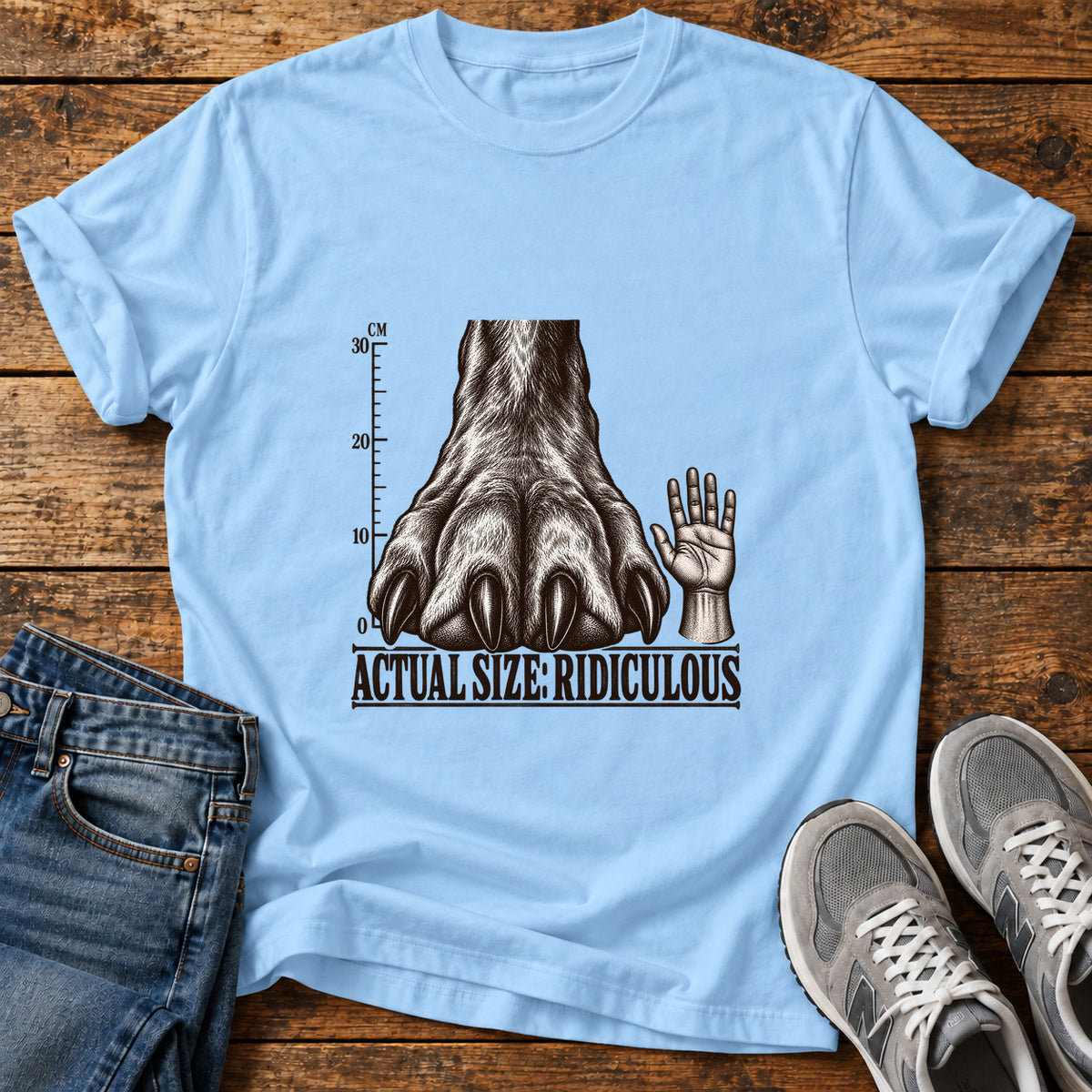 Actual Size Ridiculous Great Dane graphic T-shirt in Light Blue, shown on a flat-lay shirt mockup
