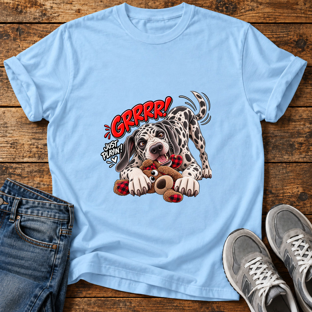 Grrr Just Playin Great Dane graphic T-shirt in Light Blue, shown on a flat-lay shirt mockup