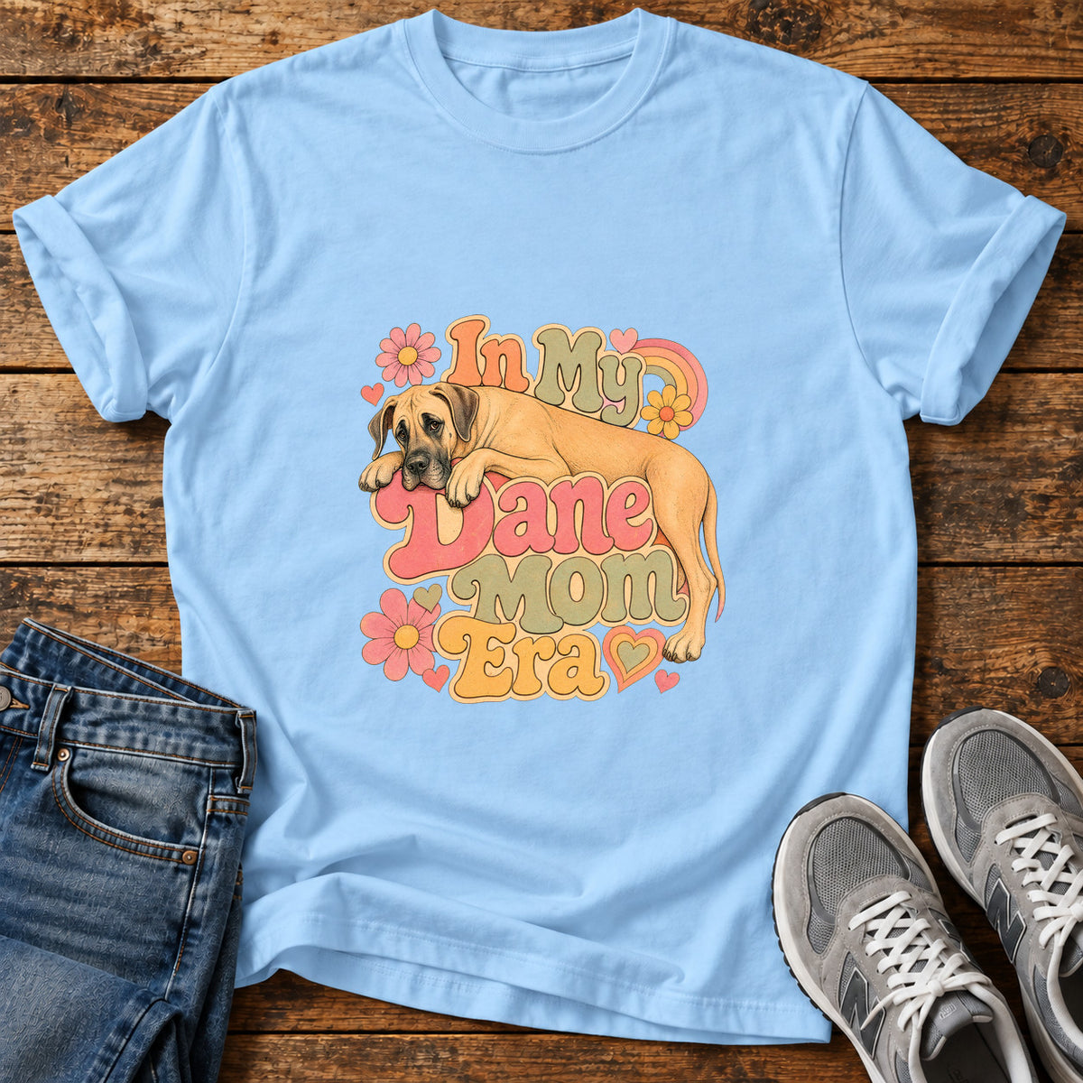 Dane Mom Era Great Dane graphic T-shirt in Light Blue, shown on a flat-lay shirt mockup
