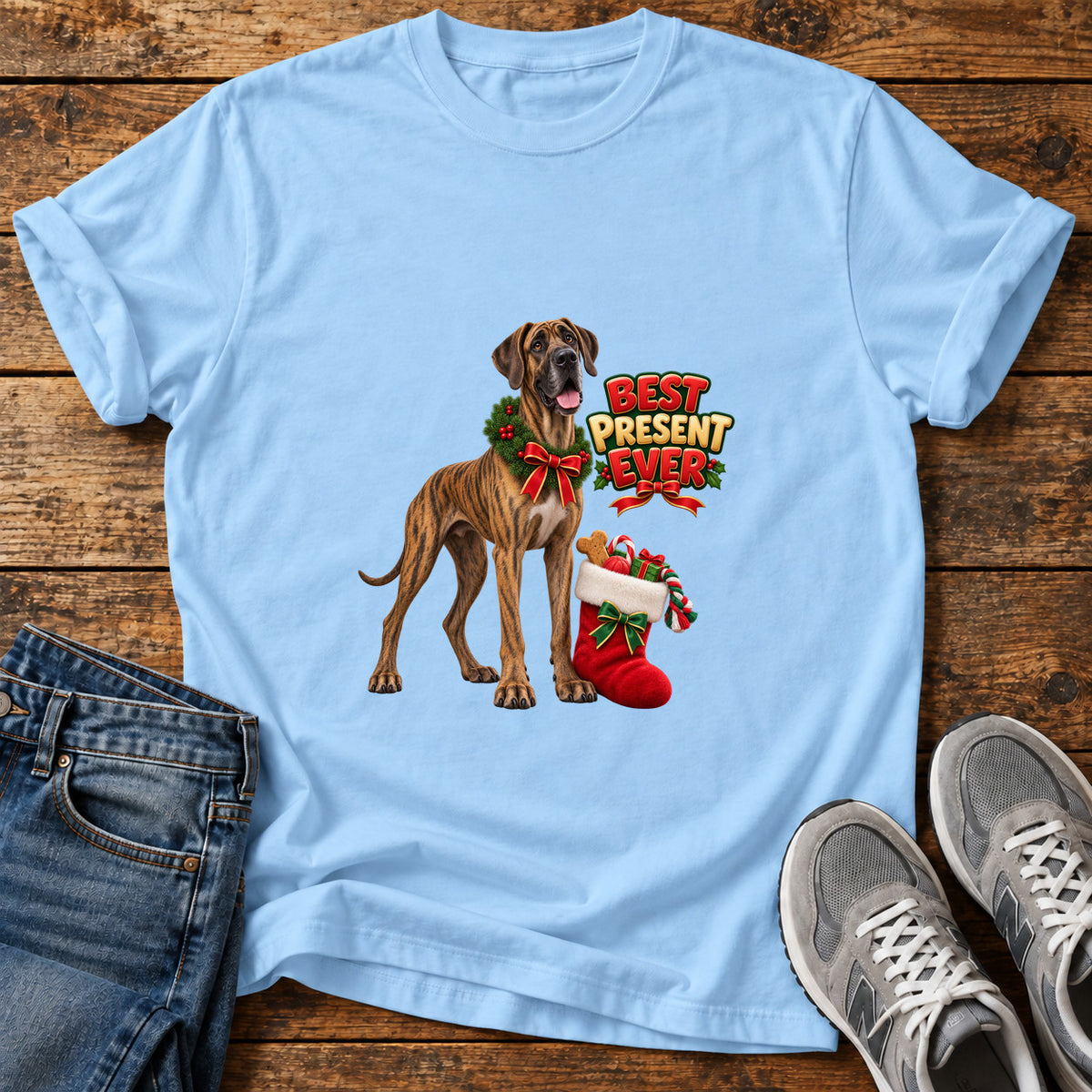 Best Present Ever Great Dane graphic T-shirt in Light Blue, shown on a flat-lay shirt mockup