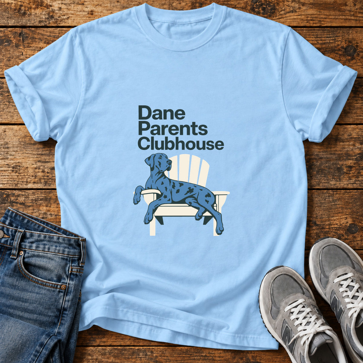 Dane Parents Clubhouse Great Dane graphic T-shirt in Light Blue, shown on a flat-lay shirt mockup