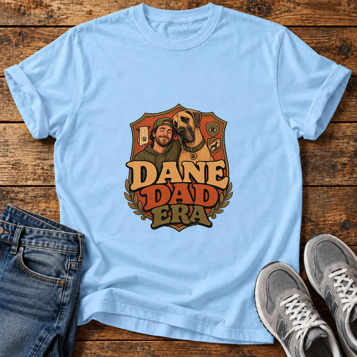 Dane Dad Era Great Dane graphic T-shirt in Light Blue, shown on a flat-lay shirt mockup