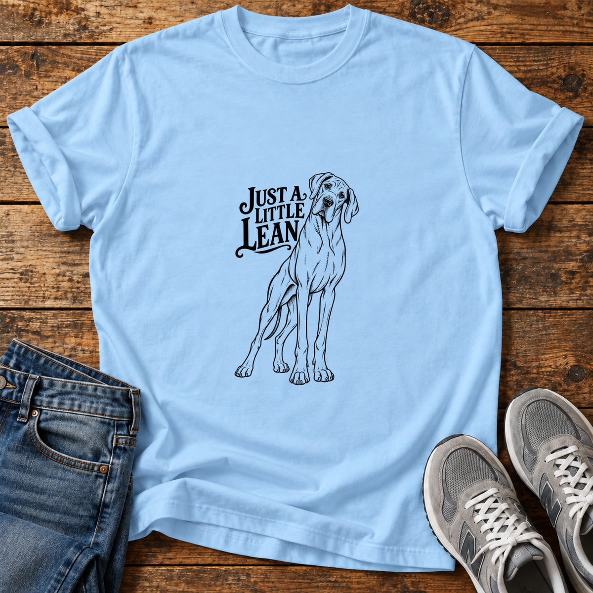 Just A Lean Great Dane graphic T-shirt in Light Blue, shown on a flat-lay shirt mockup
