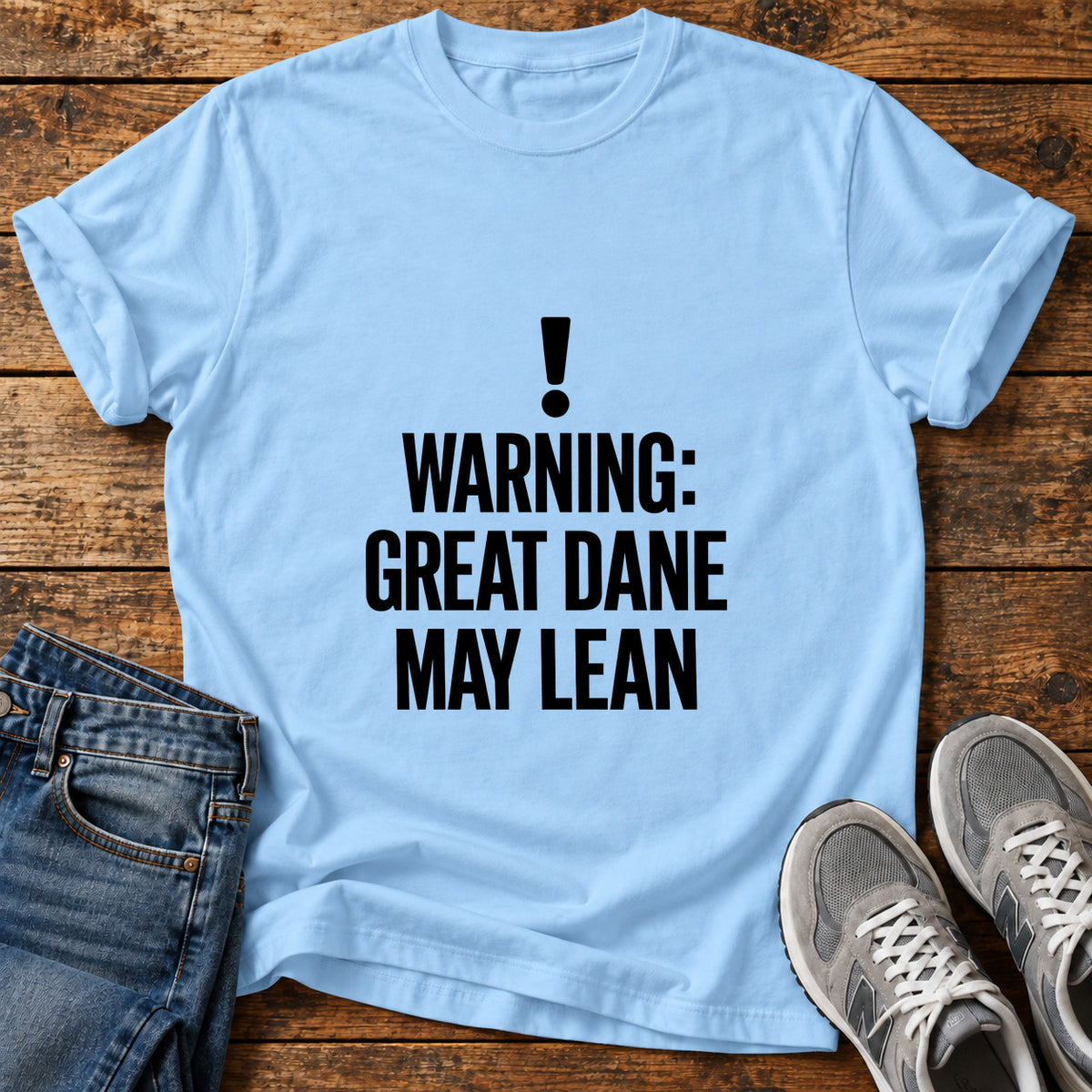 Great Dane Warning graphic T-shirt in Light Blue, shown on a flat-lay shirt mockup