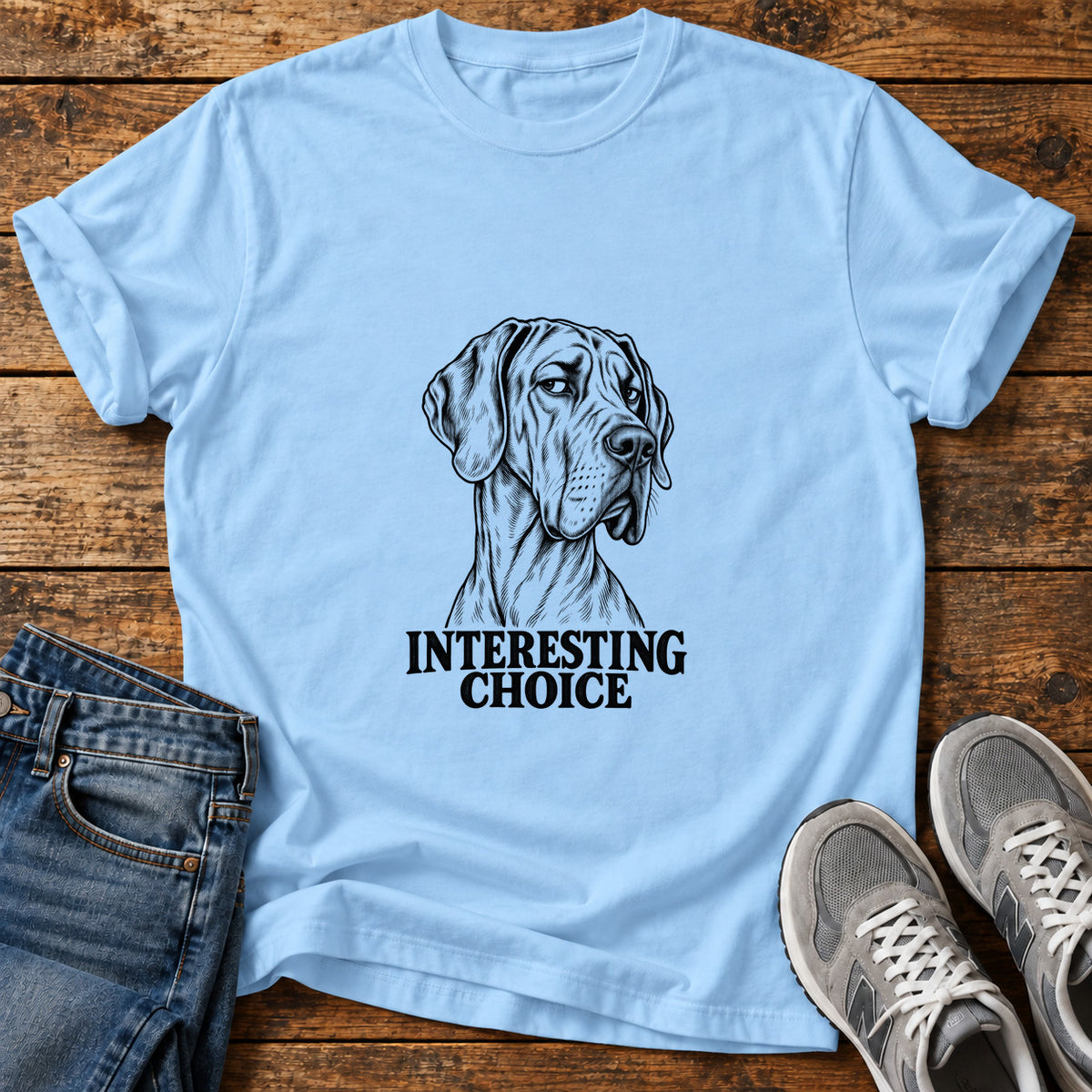 Interesting Choice Great Dane graphic T-shirt in Light Blue, shown on a flat-lay shirt mockup