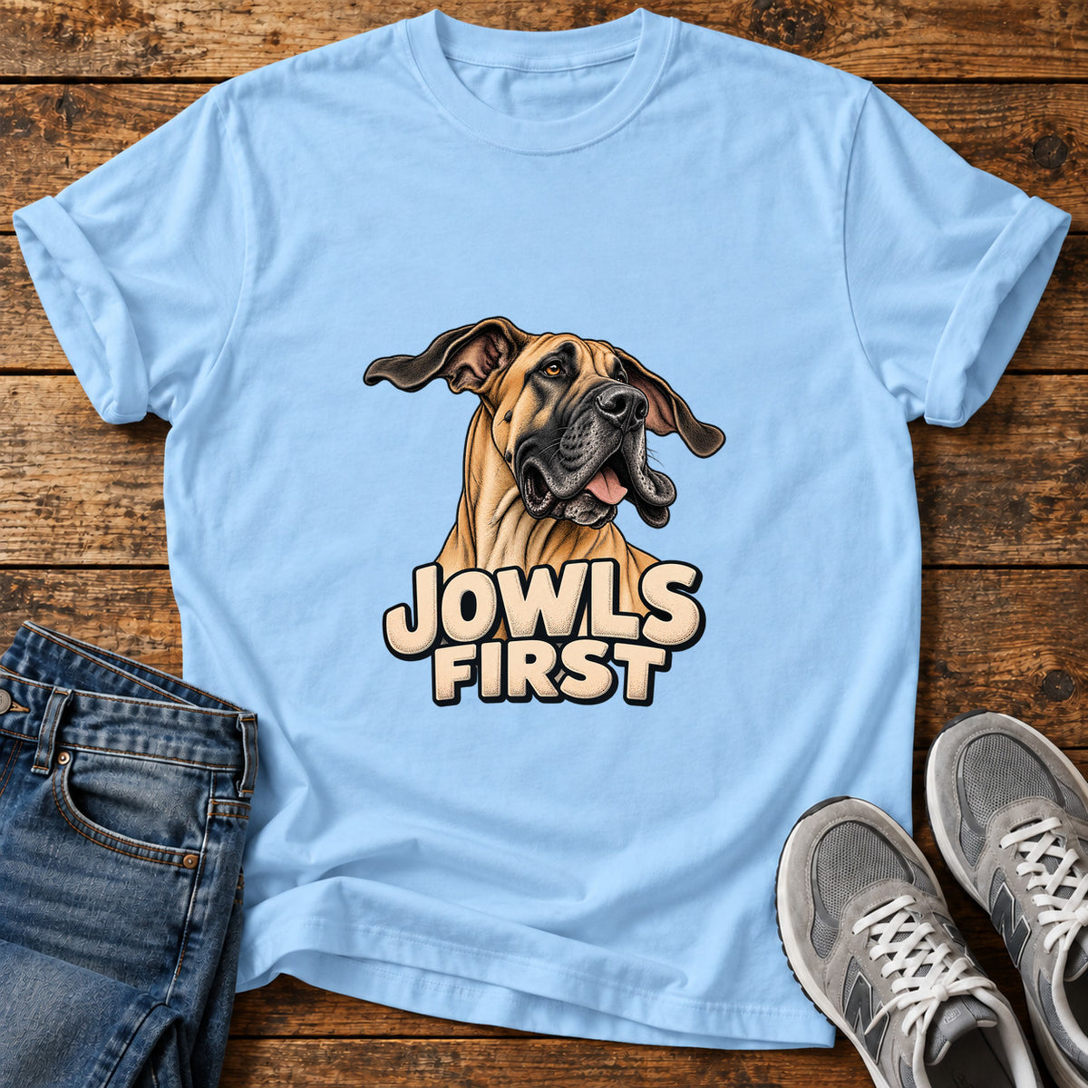 Jowls First Great Dane graphic T-shirt in Light Blue, shown on a flat-lay shirt mockup