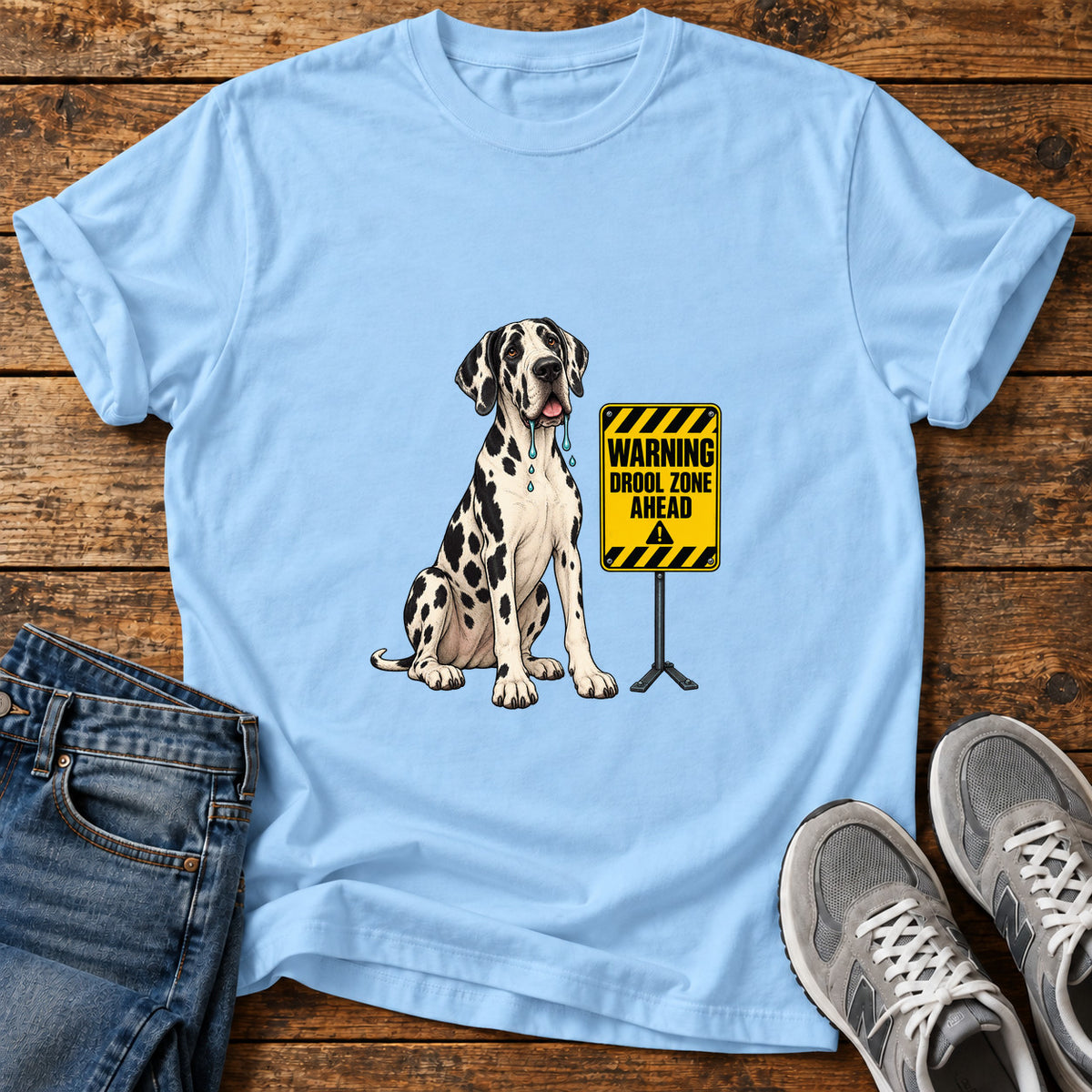 Drool Zone Warning Great Dane graphic T-shirt in Light Blue, shown on a flat-lay shirt mockup