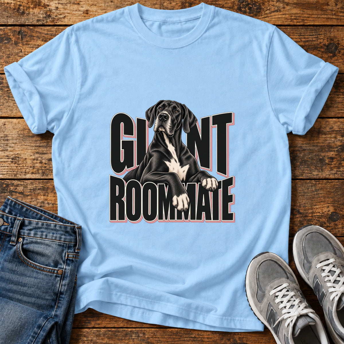 Giant Roommate Great Dane graphic T-shirt in Light Blue, shown on a flat-lay shirt mockup