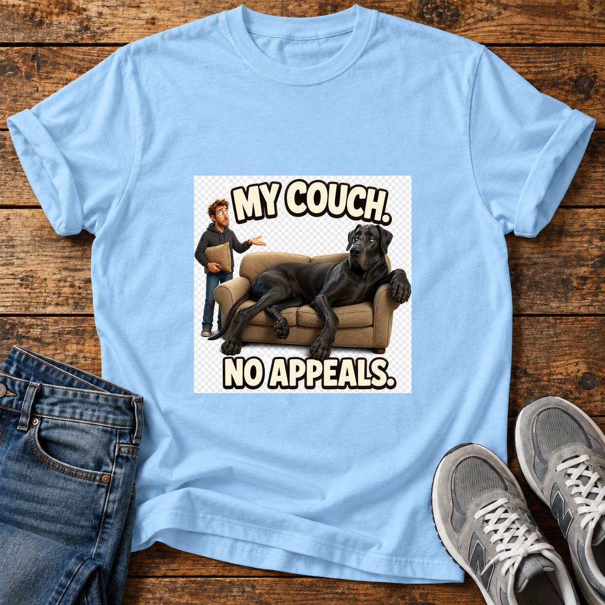 My Couch Great Dane graphic T-shirt in Light Blue, shown on a flat-lay shirt mockup
