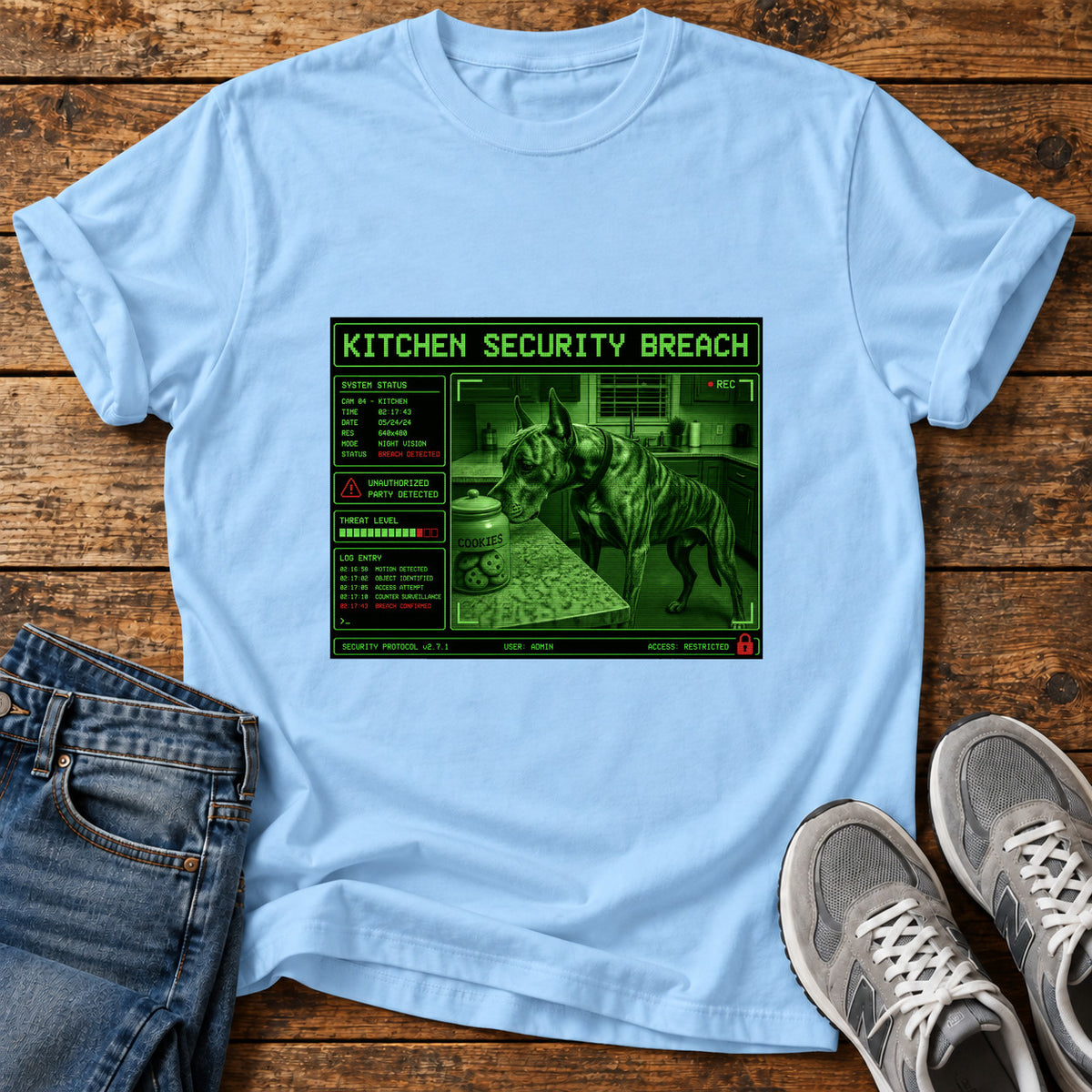 Kitchen Security Breach Great Dane graphic T-shirt in Light Blue, shown on a flat-lay shirt mockup