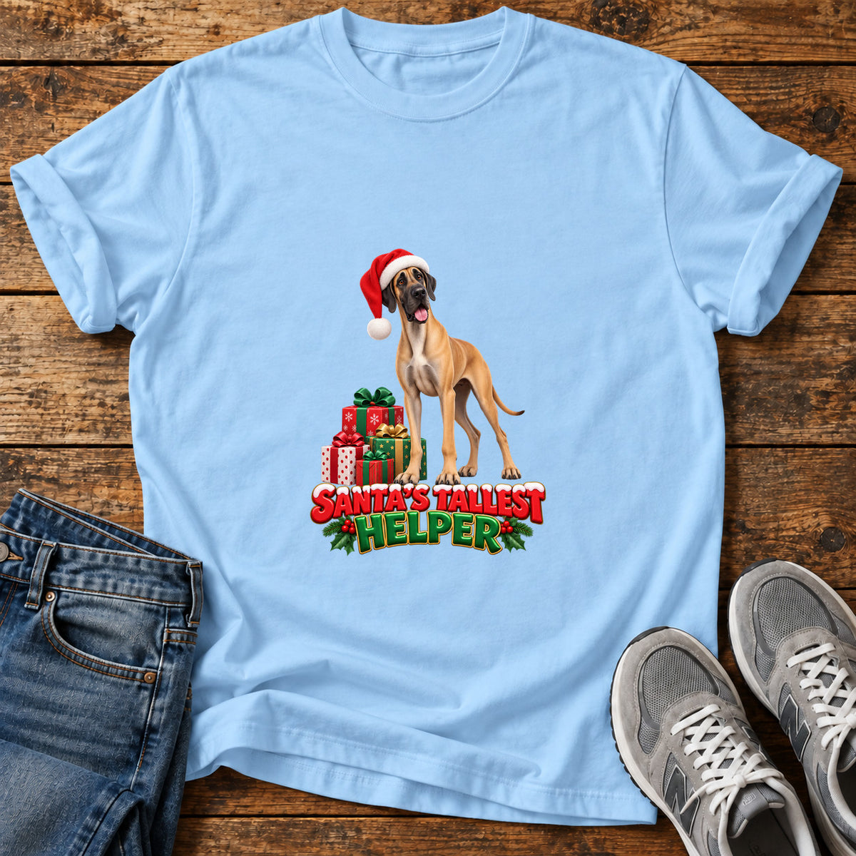 Santa's Tallest Helper Great Dane graphic T-shirt in Light Blue, shown on a flat-lay shirt mockup