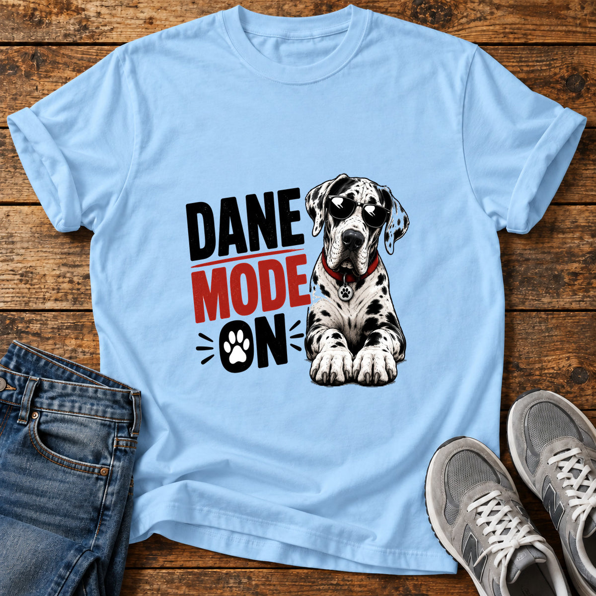 Dane Mode On Great Dane graphic T-shirt in Light Blue, shown on a flat-lay shirt mockup