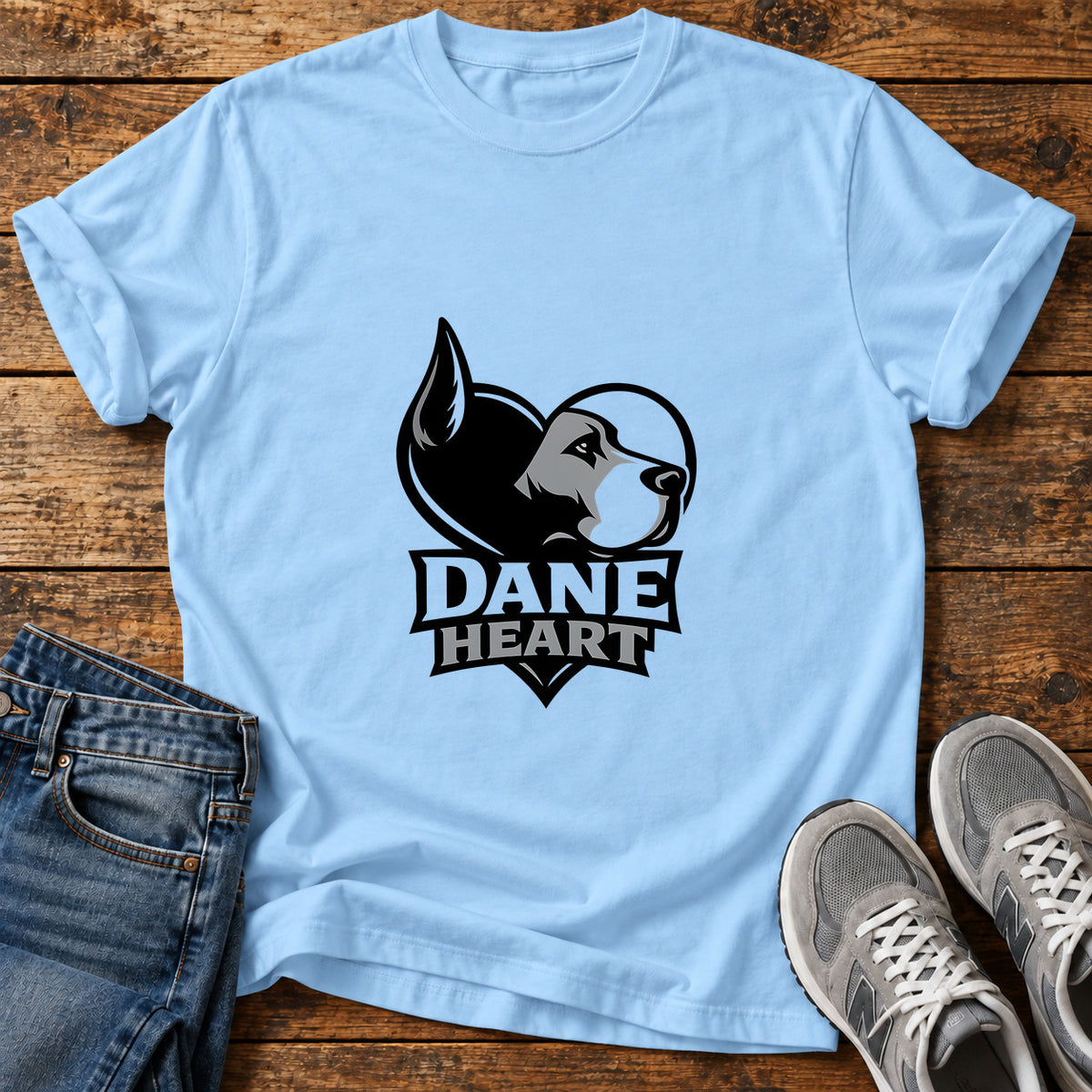 Dane Heart Great Dane graphic T-shirt in Light Blue, shown on a flat-lay shirt mockup