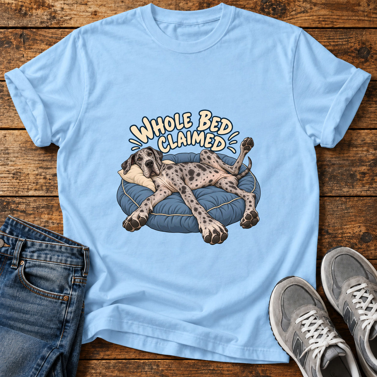 Whole Bed Claimed Great Dane graphic T-shirt in Light Blue, shown on a flat-lay shirt mockup