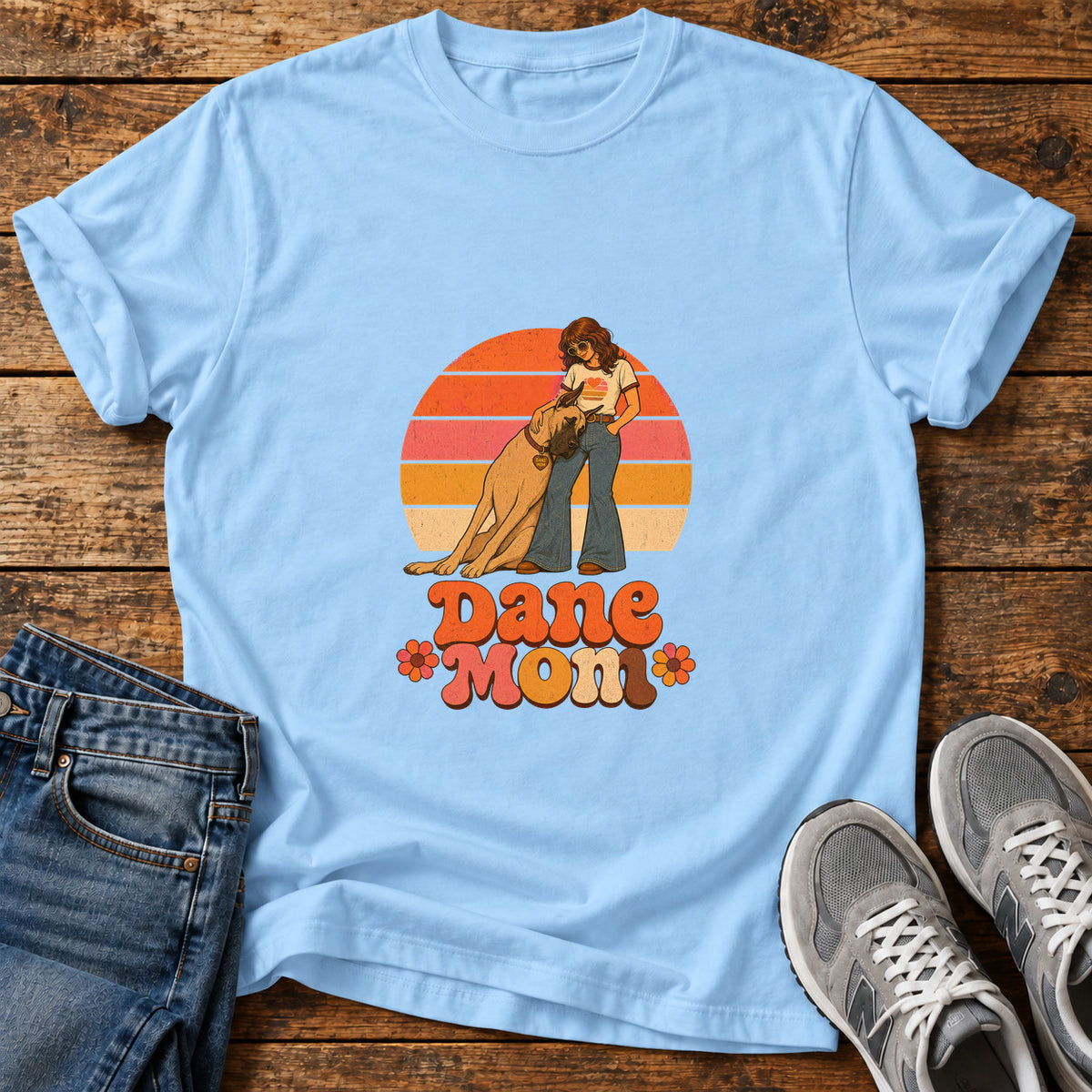 Dane Mom Great Dane graphic T-shirt in Light Blue, shown on a flat-lay shirt mockup