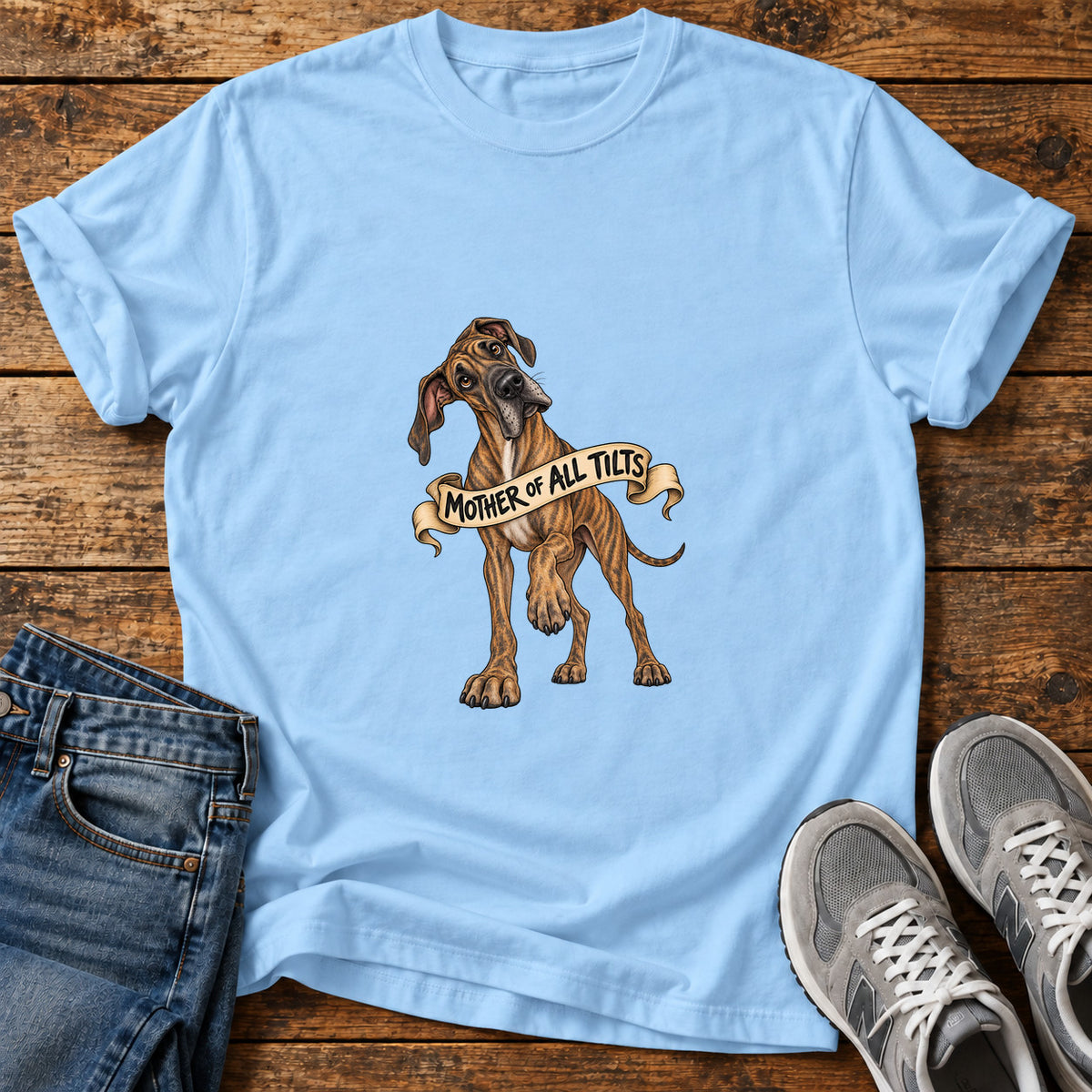 Mother of Tilts Great Dane graphic T-shirt in Light Blue, shown on a flat-lay shirt mockup