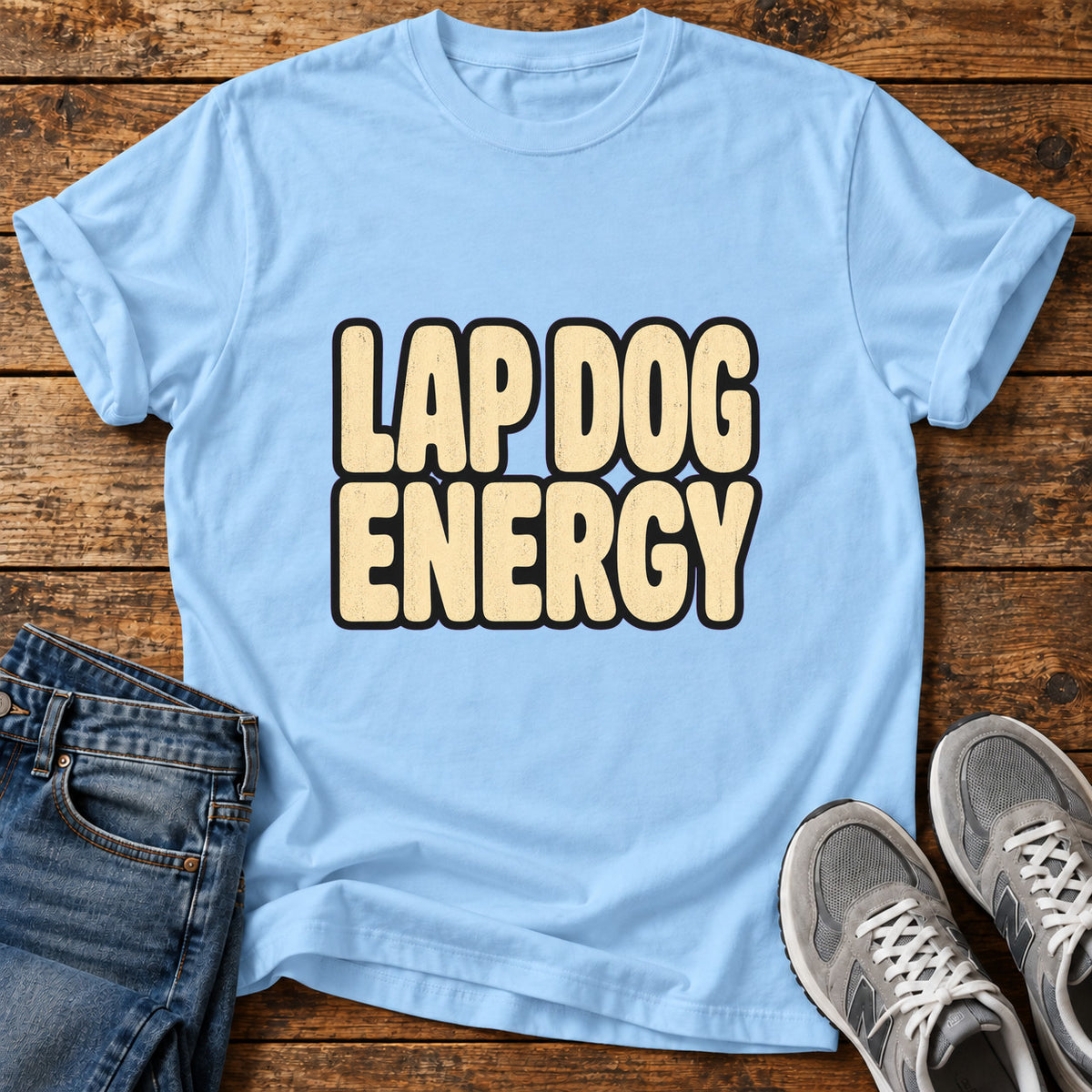 Lap Dog Energy Great Dane graphic T-shirt in Light Blue, shown on a flat-lay shirt mockup